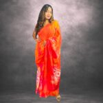 Alloy Orange Handcrafted Cotten Batik Saree with Flowers  Design